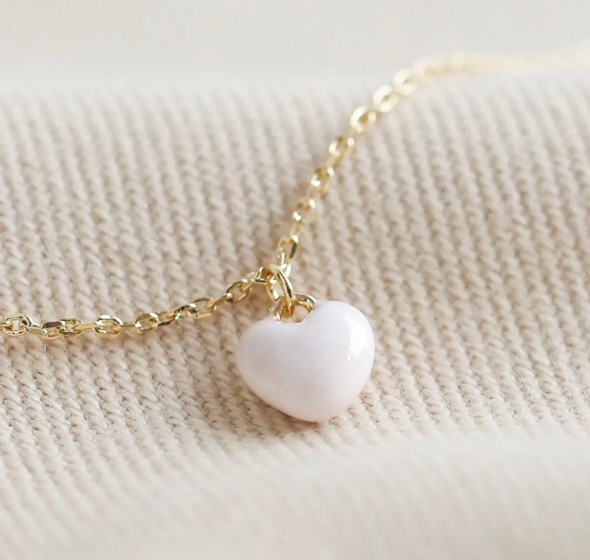 Tiny enamel pale pink heart necklace