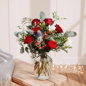 Christmas Vase of Red Seasonal Flowers